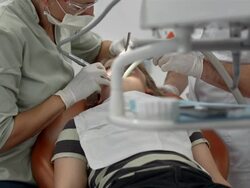 HD DOLLY: Dentist Drilling A Tooth Stock Footage