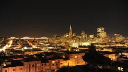 Golden lights sparkle along San Francisco's skyline. Stock Footage