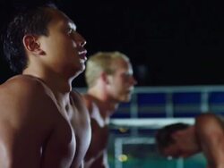 MS TU PAN Waterpolo team back stretches at swimming pool / Riverside, California, United States Stock Footage