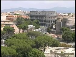 Rome Colosseum / Coliseum Pull Wide to Cityscape Stock Footage