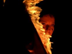 HD Super Slow-Mo: Female Performer Spinning Fire Poi Stock Footage