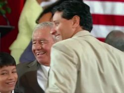 MS Senior man and family including boy (8-9) and girl (14-15) rejoicing after being sworn in for citizenship / Tampa, Florida, USA Stock Footage