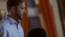 Restaurant owner visits table and chats with customers Stock Footage