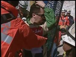 One by one, the miners trapped for 69 days in a dungeon that could have been their tomb climbed into a rescue capsule and made a smooth ascent to the surface Wednesday, greeted by the embraces of loved ones, cheered by joyous Chileans and watched by a captivated world. News Clip