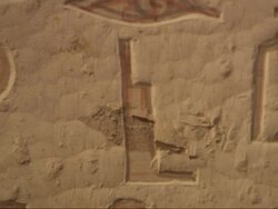 Extreme Close Up, pan-right - Hieroglyphics are carved into a wall / Egypt Stock Footage