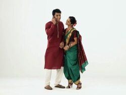 Marathi couple talking on a mobile phone  Stock Footage