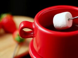 CU R/F PAN TU Hands coating marshmallow with melted chocolate / Seoul, South Korea Stock Footage