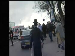 More than two dozen people have been injured in a bomb explosion at a crowded bus stop in central Jerusalem. It appears to be the first militant attack in the city in several years. News Clip