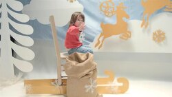 Child Playing in The Christmas Set Design. Stock Footage