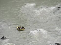 WS TS Tourists rafting in ganges river / Rishikesh, Uttarakhand, India Stock Footage