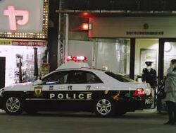 WS View of petrol car parked in front of Shinbashi Police Information Box / Tokyo, Tokyo-To, Japan Stock Footage