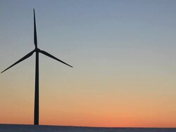 HD video of a Wind turbine at sunset Stock Footage