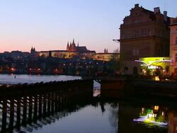 MS View of prauge city near vltava river at night / Prague, Hlavni mesto Praha, Czech Republic Stock Footage