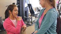 Physical therapist evaluates senior female client Stock Footage