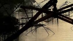 Silhoette scene of fishing trap in southeast asia country. Stock Footage