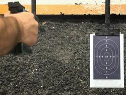 Shooting handgun pistol at target range. Stock Footage