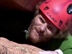ECU of climbers face in very wide crack / Zion,UT,USA Stock Footage