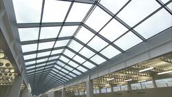 Skylights illuminate a factory. Stock Footage