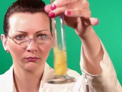 Lab worker checking test tube Stock Footage