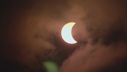 Cloudy Solar Eclipse News Clip