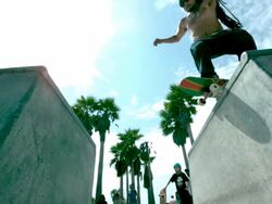 MS SLO MO LA TS Shot of skateboarder doing front side jump in skate park but does not land it / Venice, California, United States Stock Footage