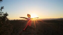 Young African American Woman Doing Yoga in Desert Stock Footage