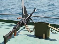machine gun on the deck of a ship Stock Footage