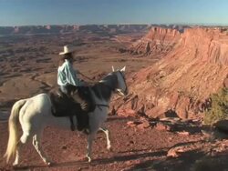 MS Women Riding Horses into Spectaculair Red Rock Mountains, Majestic Western Landscapes / Telluride, Colorado, United States Stock Footage