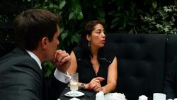 MS Businesswoman leading discussion with businessmen during lunch meeting in restaurant Stock Footage