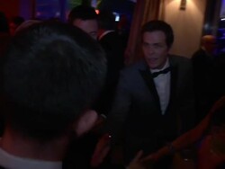 Anderson Cooper, Hugh Jackman at the 2011 Vanity Fair Oscar Party Inside  at Hollywood CA. (Footage by WireImage Video/GettyImages) Stock Footage