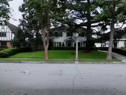  WS Three different styled houses off paved road / Hooker, OK, United States  Stock Footage