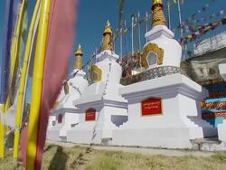 MS Stupas and flags in Buddhist monastery / Darjeeling, West Bengal, India Stock Footage