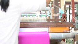 Traditional Thai silk weaving by using the loom. Stock Footage