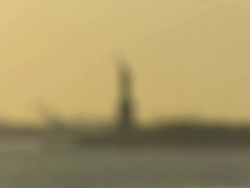 Statue of Liberty, cranes in background, New York City, USA Stock Footage