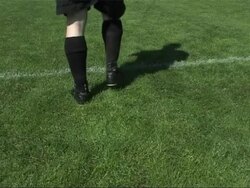 Soccer player and shadow Stock Footage