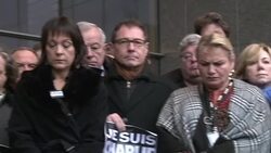 CLEAN : EU flags at half mast minute's silence for Paris victims News Clip