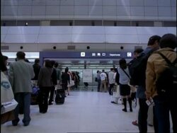 Golden week holiday crowds, queues at departure gate, Tokyo International Airport, Haneda, Japan Stock Footage