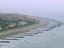 WS AERIAL View of Groynes beach at Frontignan / Languedoc Roussillon, France Stock Footage