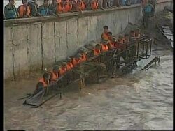 China - Soldiers try to repair broken dam News Clip