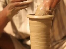 Man making a earthen pot on a pottery wheel, Faridabad, Haryana, India Stock Footage