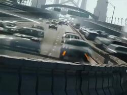 Time lapse multiple lanes of commuter traffic congestion race around curve toward and away from camera across the Ben Franklin Bridge. Stock Footage