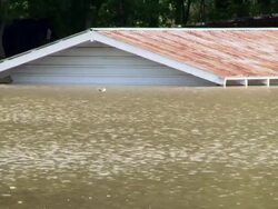 May 9, 2011 Mississippi River Flooding, the roof of a storage is barely visible in northwest Memphis, Tennessee, USA Stock Footage