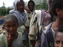 People gathered around camera at fair Stock Footage
