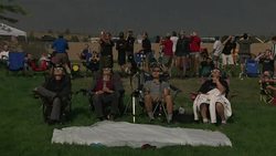 People viewing the total solar eclipse at Solarfest in Madras, Oregon News Clip