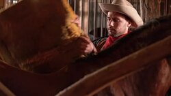 DS Rancher saddling his horse Stock Footage