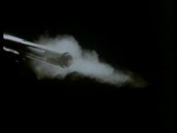 High Speed Barrel of Armelite rifle fires bullet left to right, smoke, black background Stock Footage