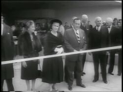 B/W 1959 group of people standing by ribbon for dedication of Guggenheim Museum / NYC / newsreel Stock Footage