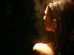 MS PAN Sexy young woman taking bath under shower Stock Footage