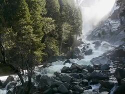 Vernal Fall in morning mist and cascading Merced River in Yosemite National Park, California Stock Footage