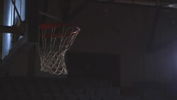 A basketball swooshes through a hoop. Stock Footage